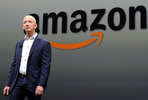 US-IT-AMAZON-KINDLE Jeff Bezos, CEO of AMAZON, introduces new Kindle Fire HD Family and Kindle Paper white during the AMAZON press conference on September 06, 2012 in Santa Monica, California. AFP PHOTO/JOE KLAMAR (Photo credit should read JOE KLAMAR/AFP/GettyImages)